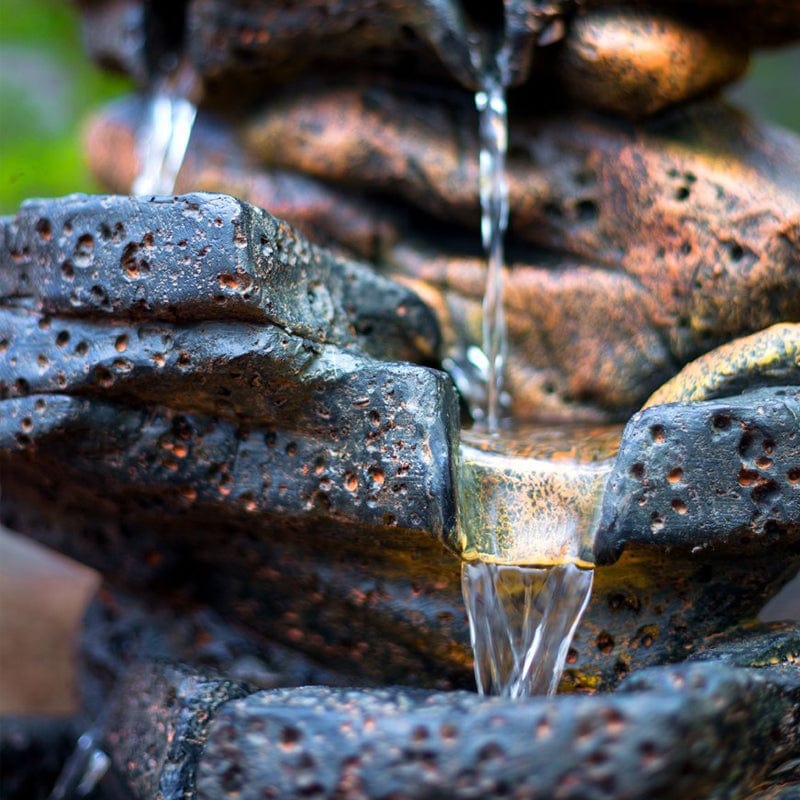 20" Lassen Stone Waterfall Rock Fountain with LED Lights - Outdoor Art Pros