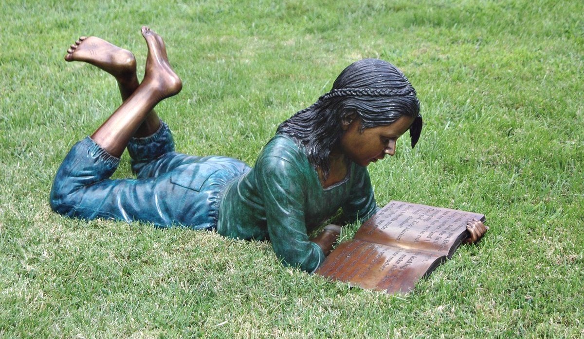 reading child concrete garden statue
