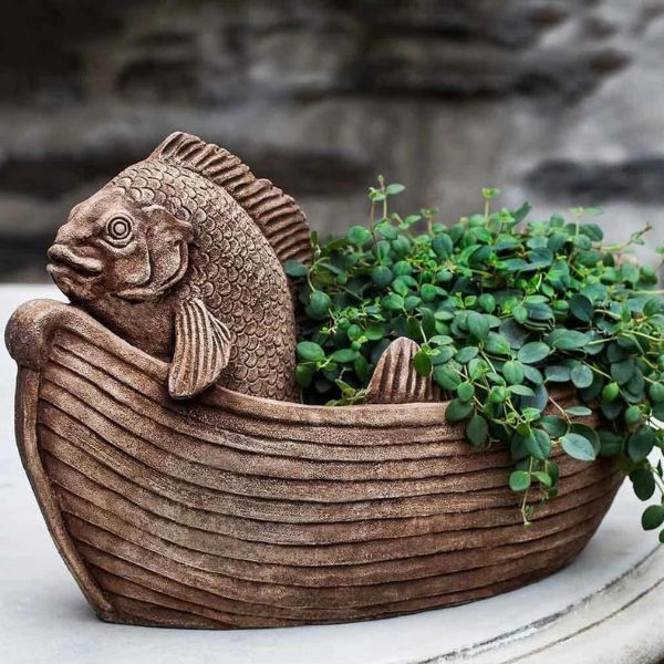 Bring a Touch of Tropical Whimsy to Your Outdoor Space with a Fish Garden Statue